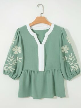 1228.  Green embroidered puff sleeve peplum top